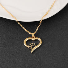 Load image into Gallery viewer, Gold Heart Necklace with Black paw 
