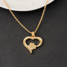 Load image into Gallery viewer, Gold Heart Necklace with Black paw 
