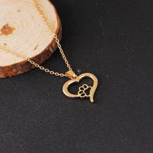 Load image into Gallery viewer, Gold Heart Necklace with Black paw 
