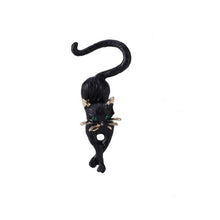 Load image into Gallery viewer, Slinky Black Cat Brooch with green eyes
