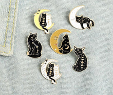 Load image into Gallery viewer, Magic Cat Brooches in black and gold
