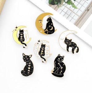 Magic Cat Brooches in black and gold